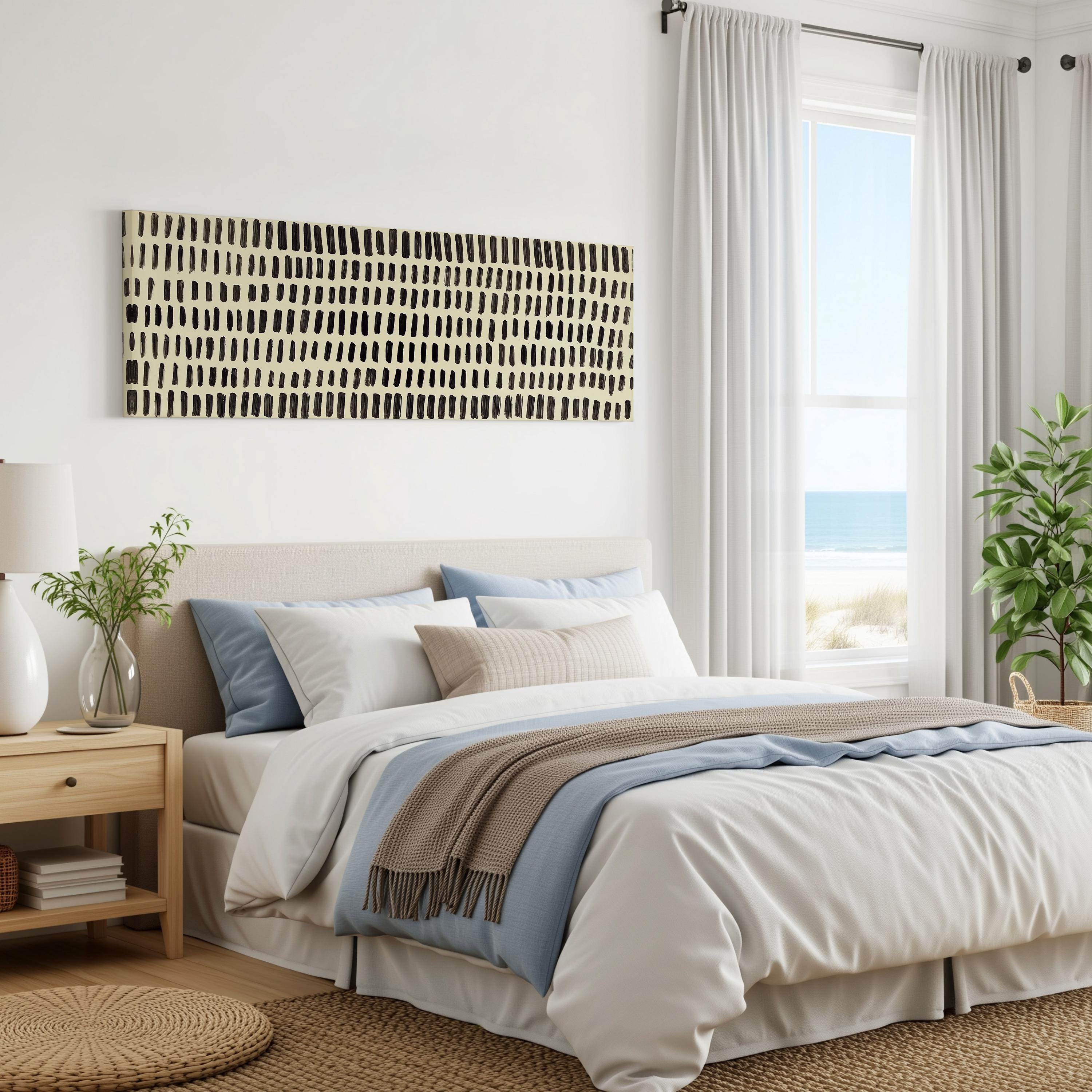 a serene and modern bedroom with a large bed, a nightstand, and a window overlooking the ocean. The room has a neutral color palette with a large abstract painting on the wall, and the overall design is minimalist and clean.