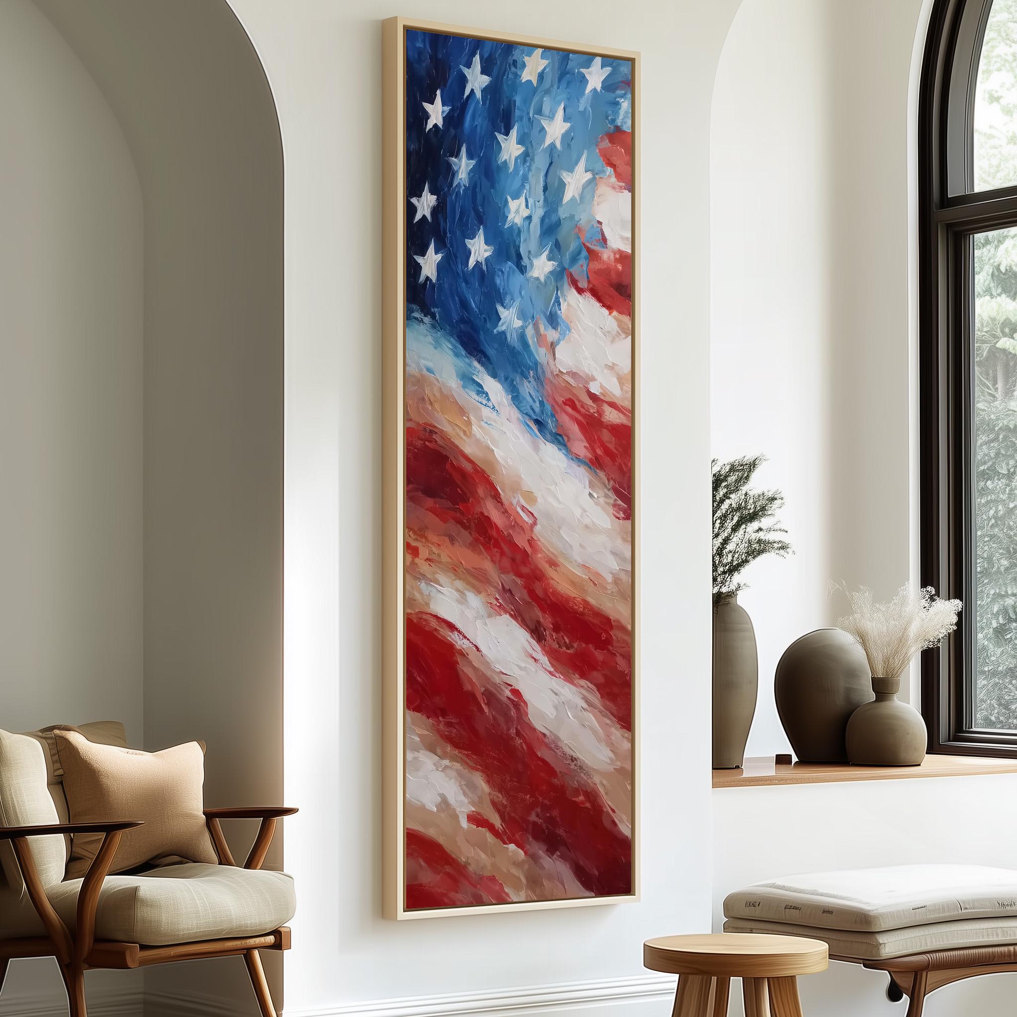 a large framed painting of the American flag hanging on a wall in a room with a wooden chair and a small table.