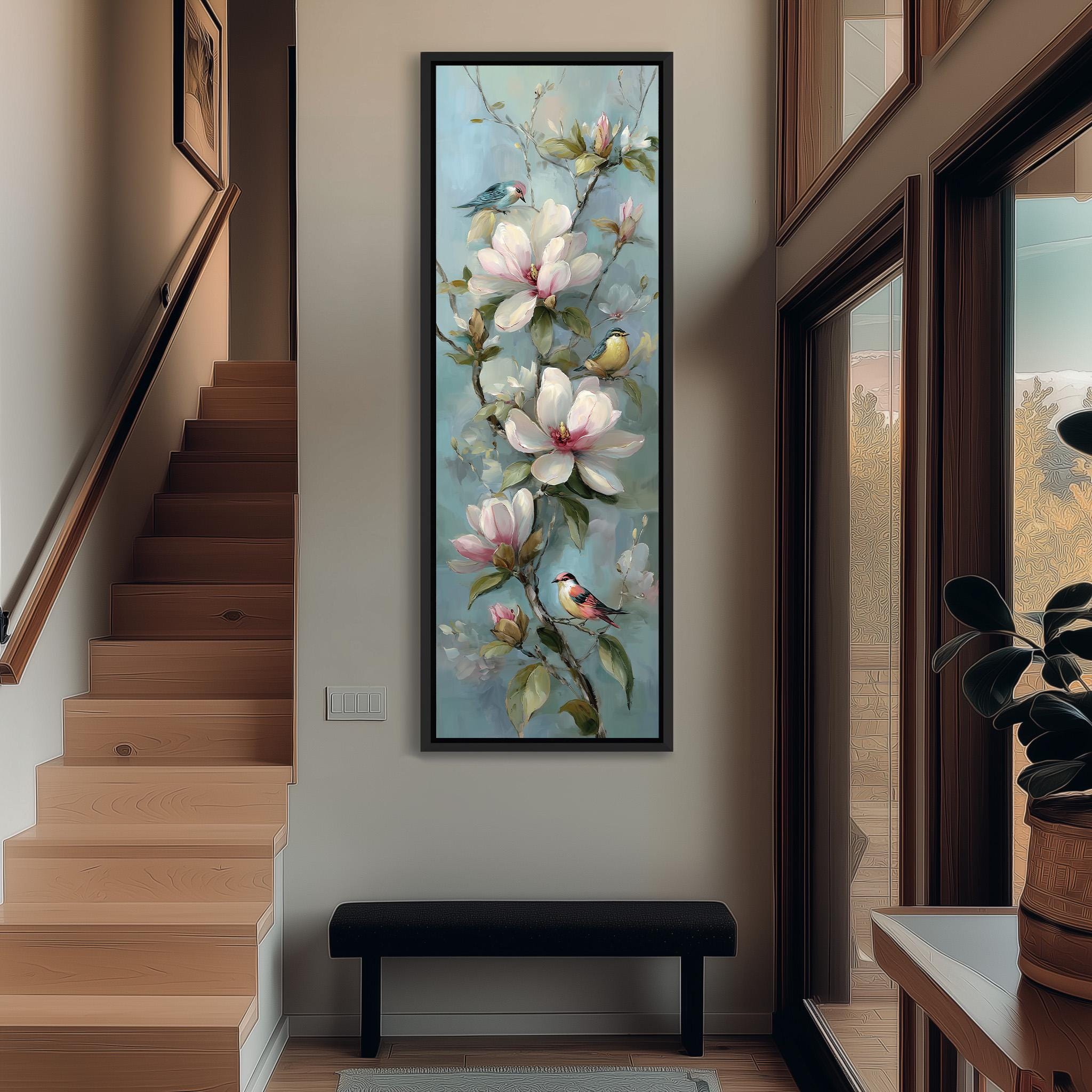 a large painting of a flower on the wall, with a bird perched on one of the flowers. The painting is framed and hangs above a black bench in a hallway.