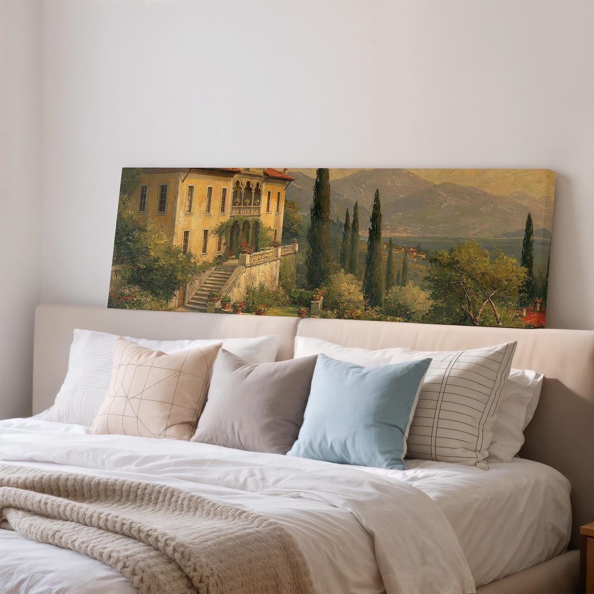 Tuscan villa among cypress hills wide panoramic canvas print above a bed in a bedroom