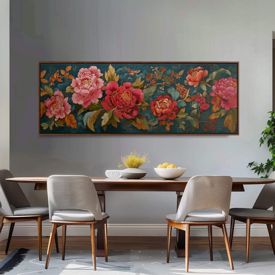 a dining room with a large floral painting hanging on the wall above a wooden dining table with four chairs. The table is set with a bowl of fruit and a vase of flowers, creating a welcoming and elegant atmosphere.