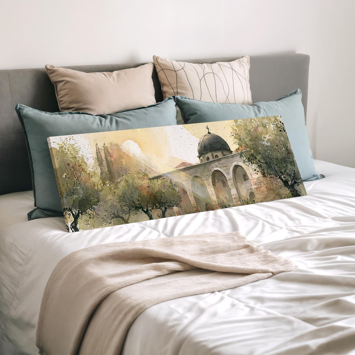 Domed mosque courtyard in watercolor wide panoramic canvas print laid on a bed to show its size