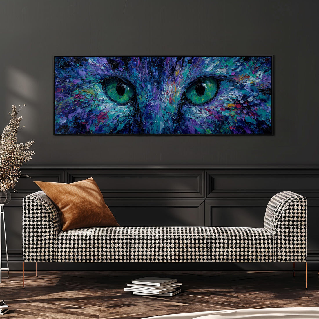 a large, colorful painting of a cat's eyes on a wall, with a black and white checkered sofa in the foreground.