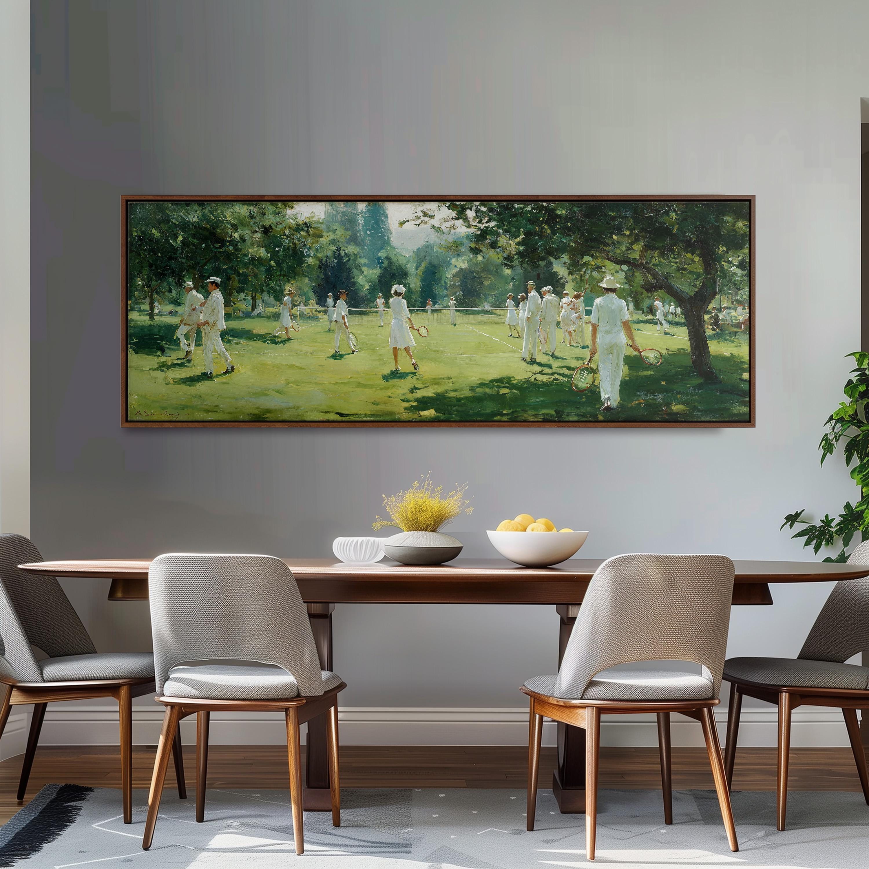 a large painting of people playing tennis on a grass court, with a bowl of fruit and a vase of flowers on the table in front of it.