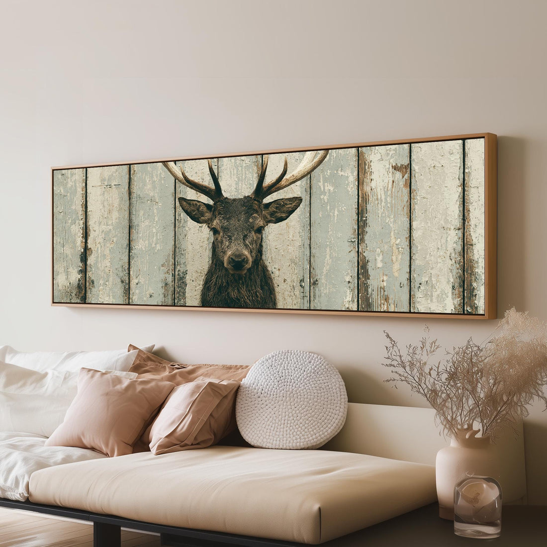 Deer portrait on weathered wood long horizontal canvas print above a sofa in a living room