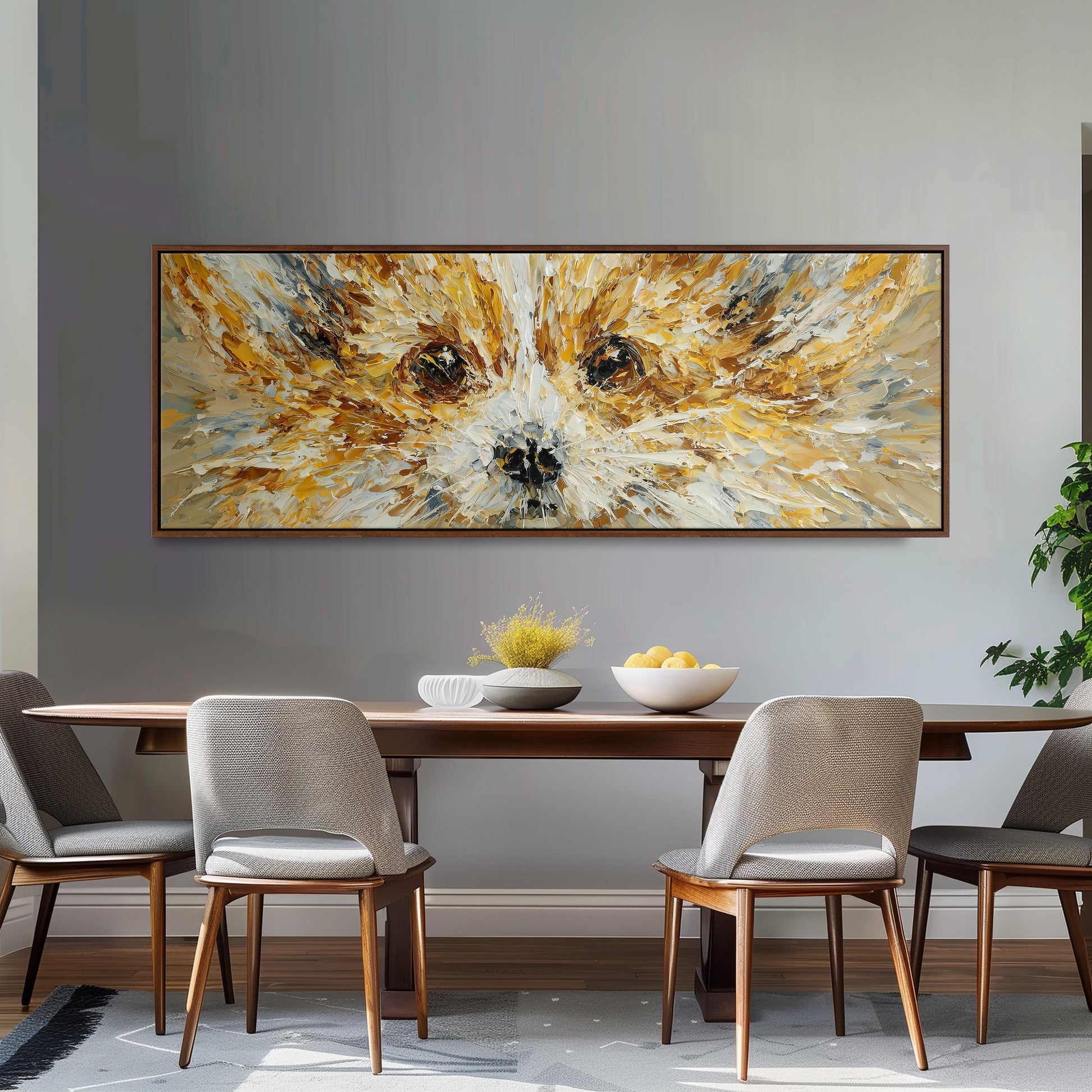 a large painting of a dog's face hanging on a wall above a wooden dining table with four chairs.
