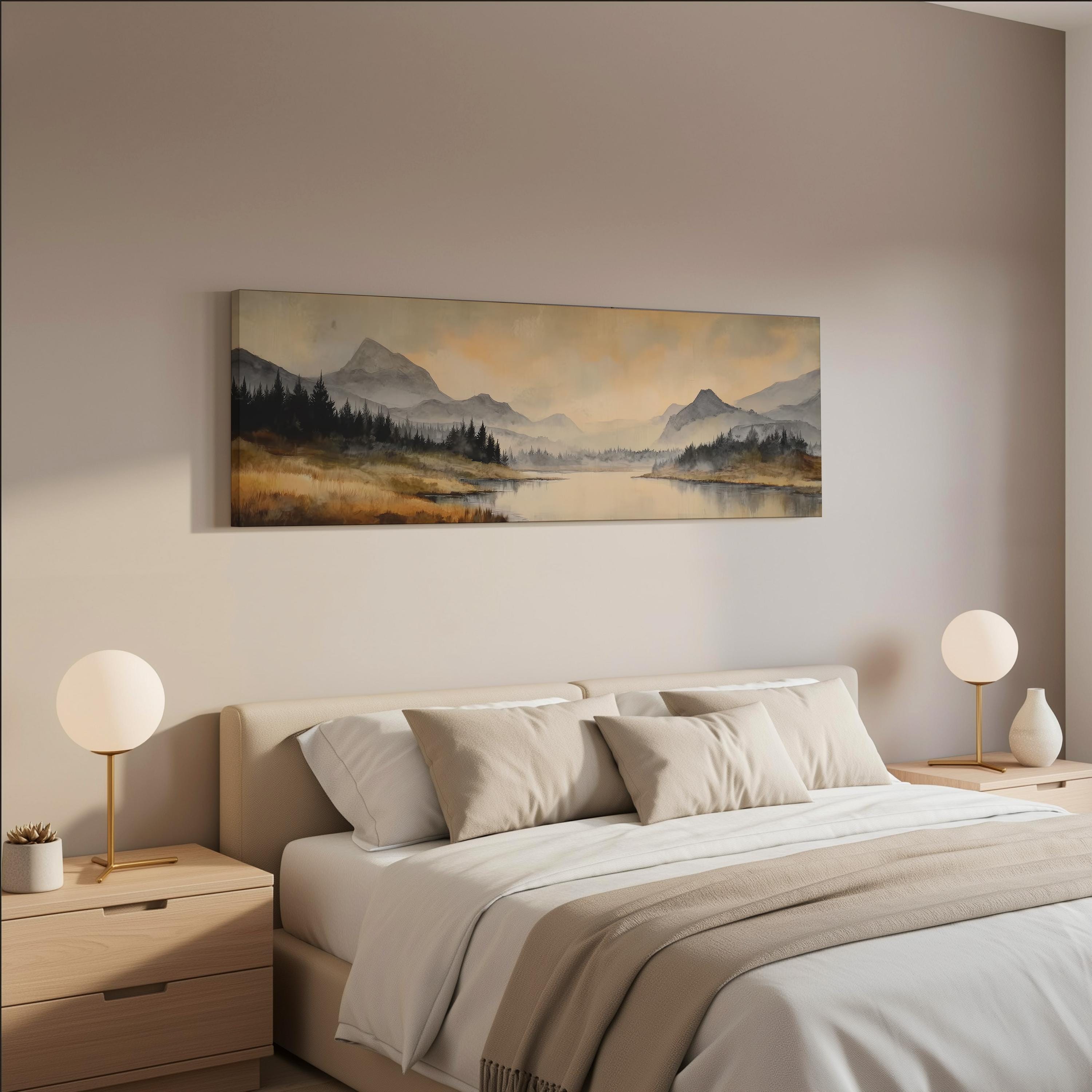 a serene bedroom with a large landscape painting hanging on the wall above a bed with white bedding and beige pillows. The painting features a mountain range and a lake, creating a peaceful and calming atmosphere.