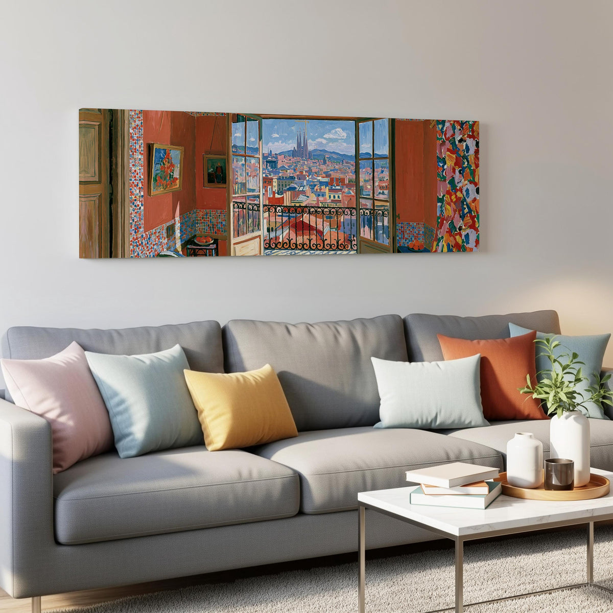Barcelona seen through an open window panoramic canvas print above a grey sofa in a living room