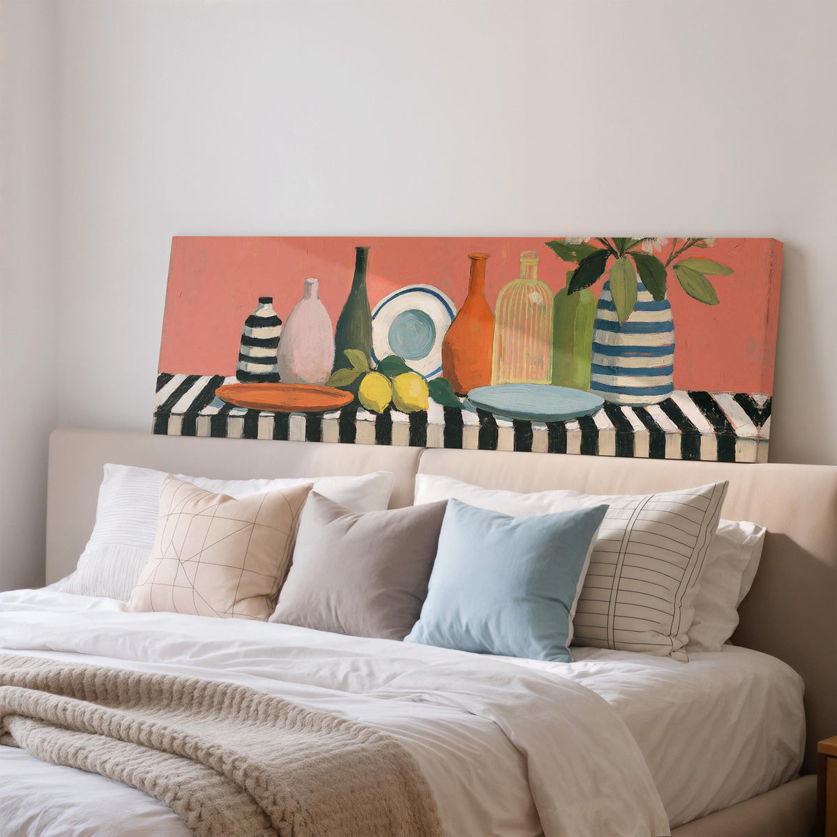 Bottles and lemons still life wide panoramic canvas print above a bed in a bedroom