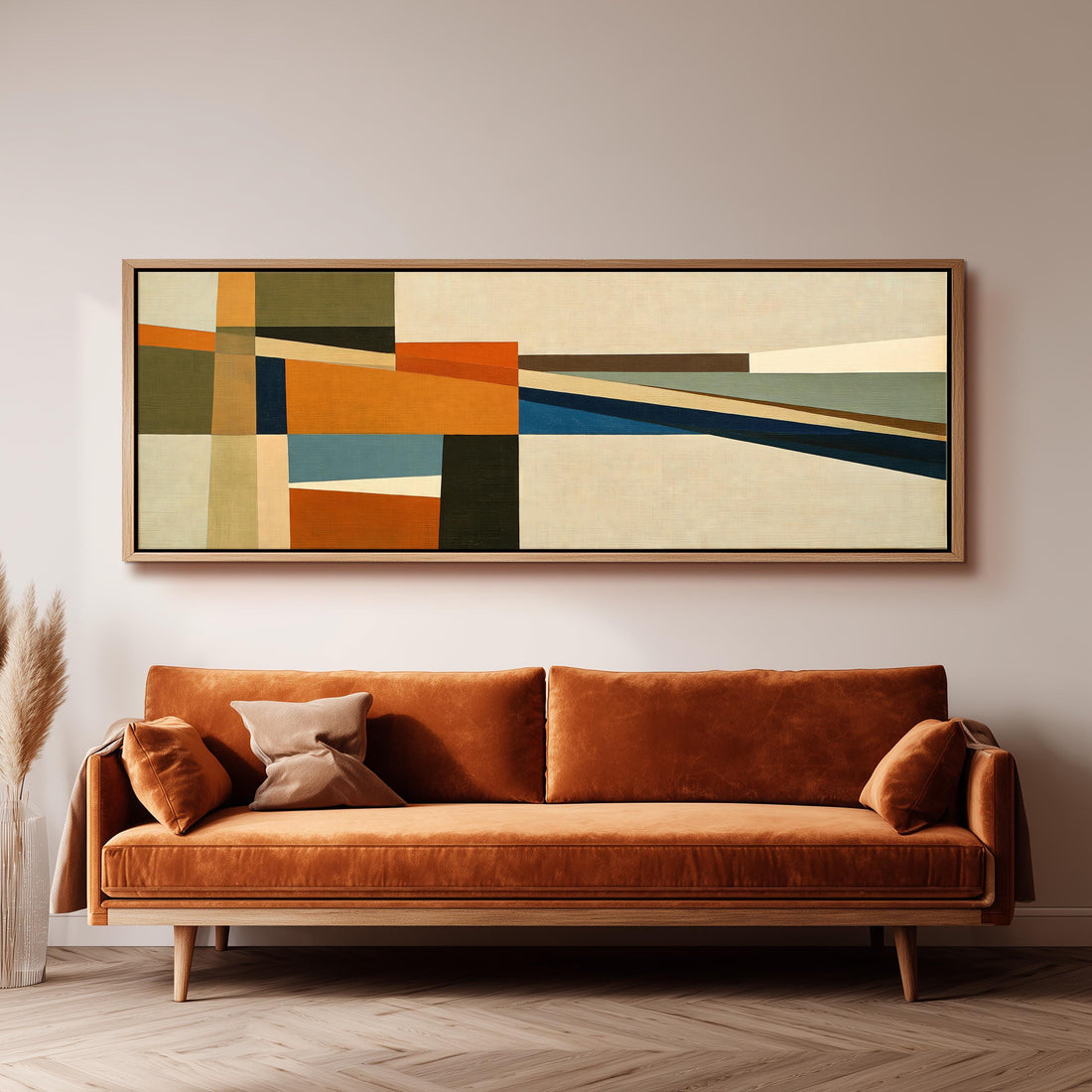 Olive and rust geometric blocks long horizontal canvas print above a sofa in a living room