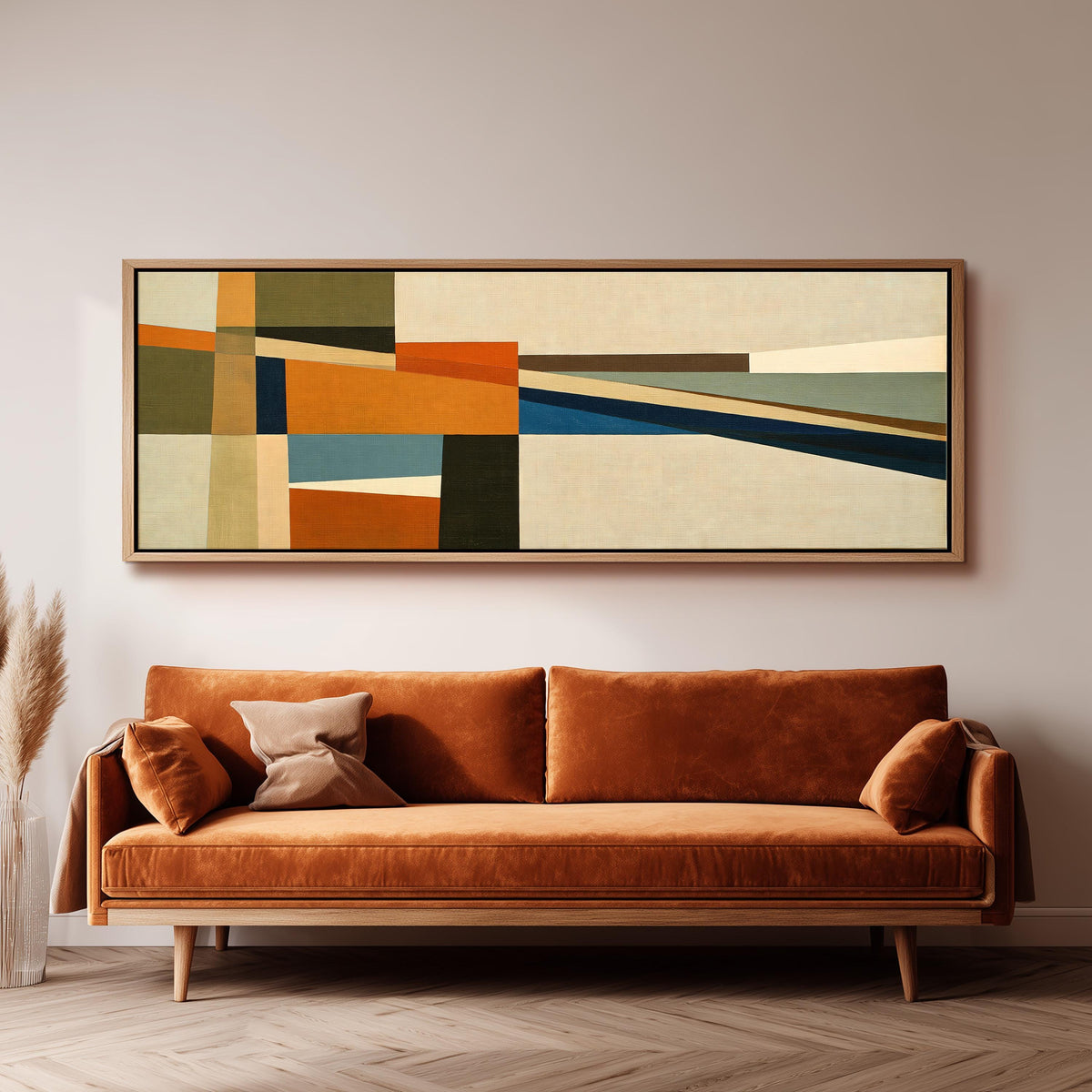Olive and rust geometric blocks panoramic canvas print above a sofa in a living room