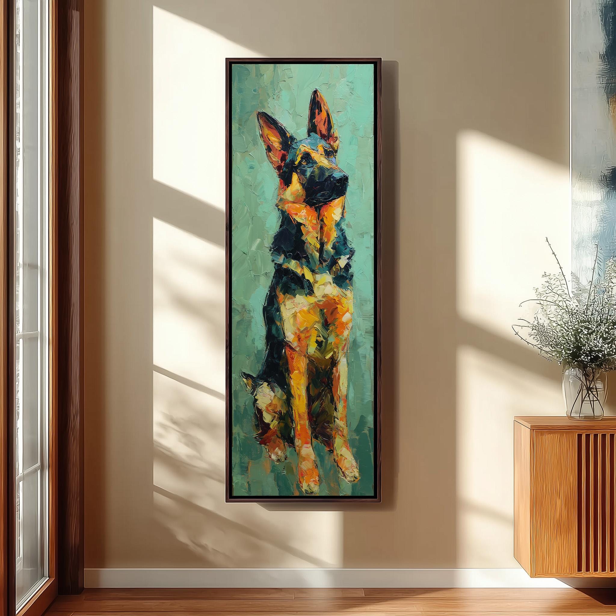 a large, colorful painting of a German Shepherd dog hanging on a wall in a room with a wooden cabinet and a vase of flowers.