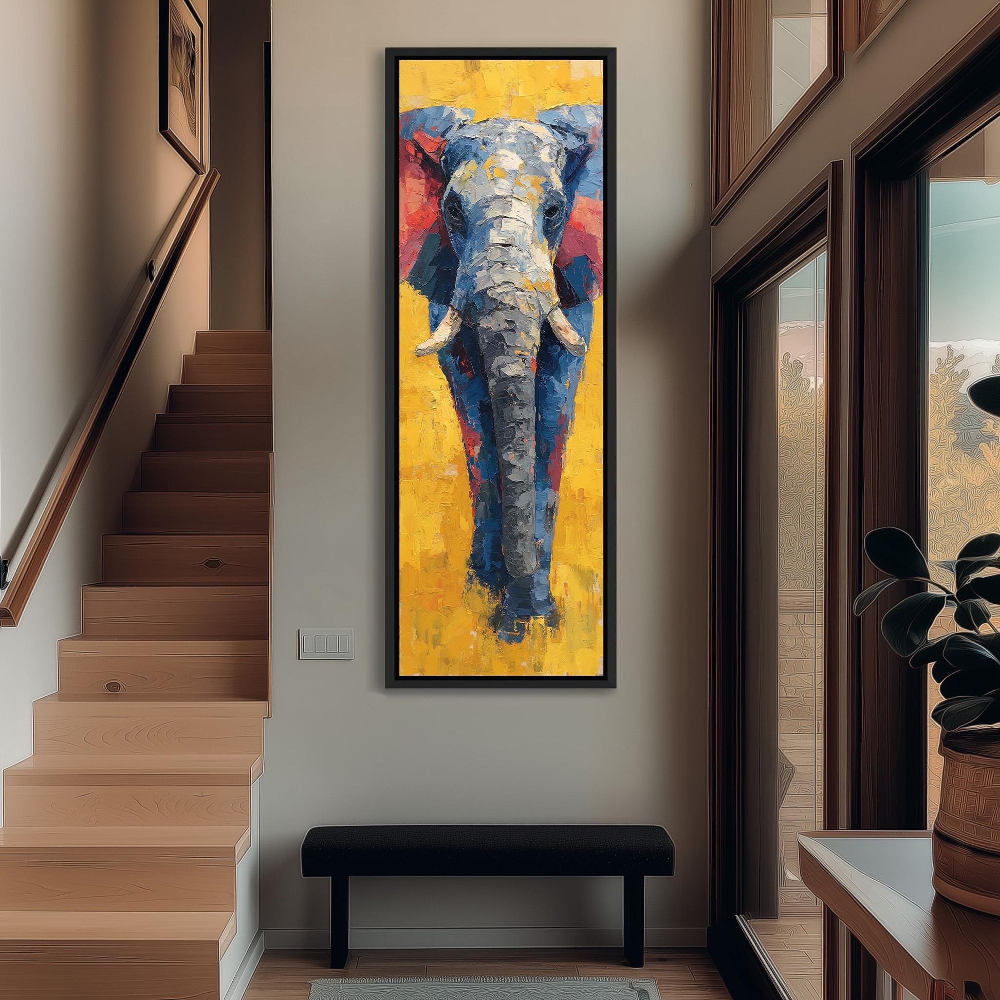 a large, colorful painting of an elephant hanging on the wall of a hallway.