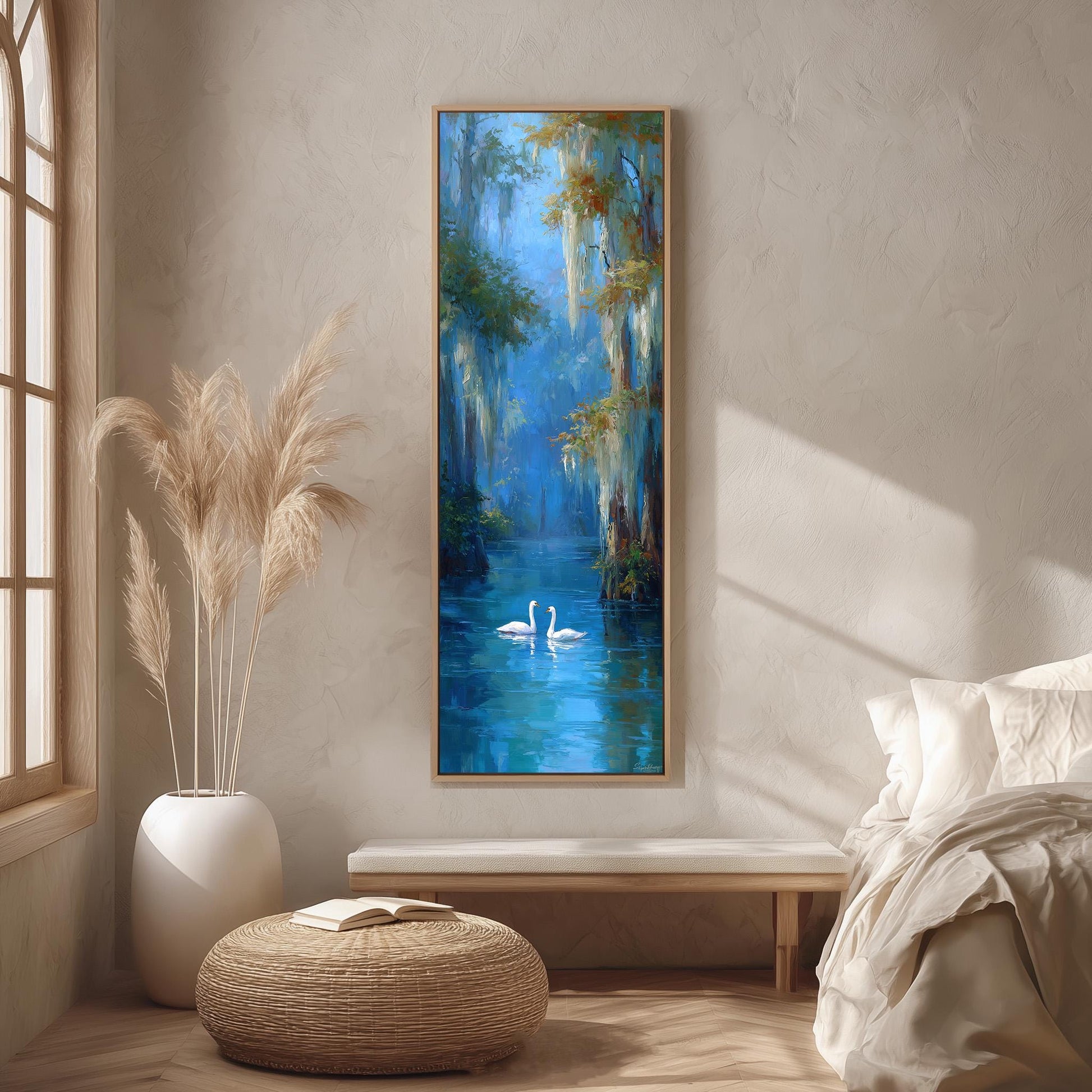 a serene indoor setting with a large painting of a tranquil scene hanging on the wall, depicting a body of water with two swans gracefully floating on the surface. The painting is framed in a wooden frame and is the focal point of the room. The room is decorated with a large window, a white vase, and a woven ottoman, creating a cozy and inviting atmosphere.