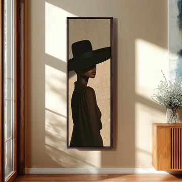 Woman in a wide black hat in profile long vertical canvas print in a sunlit living space