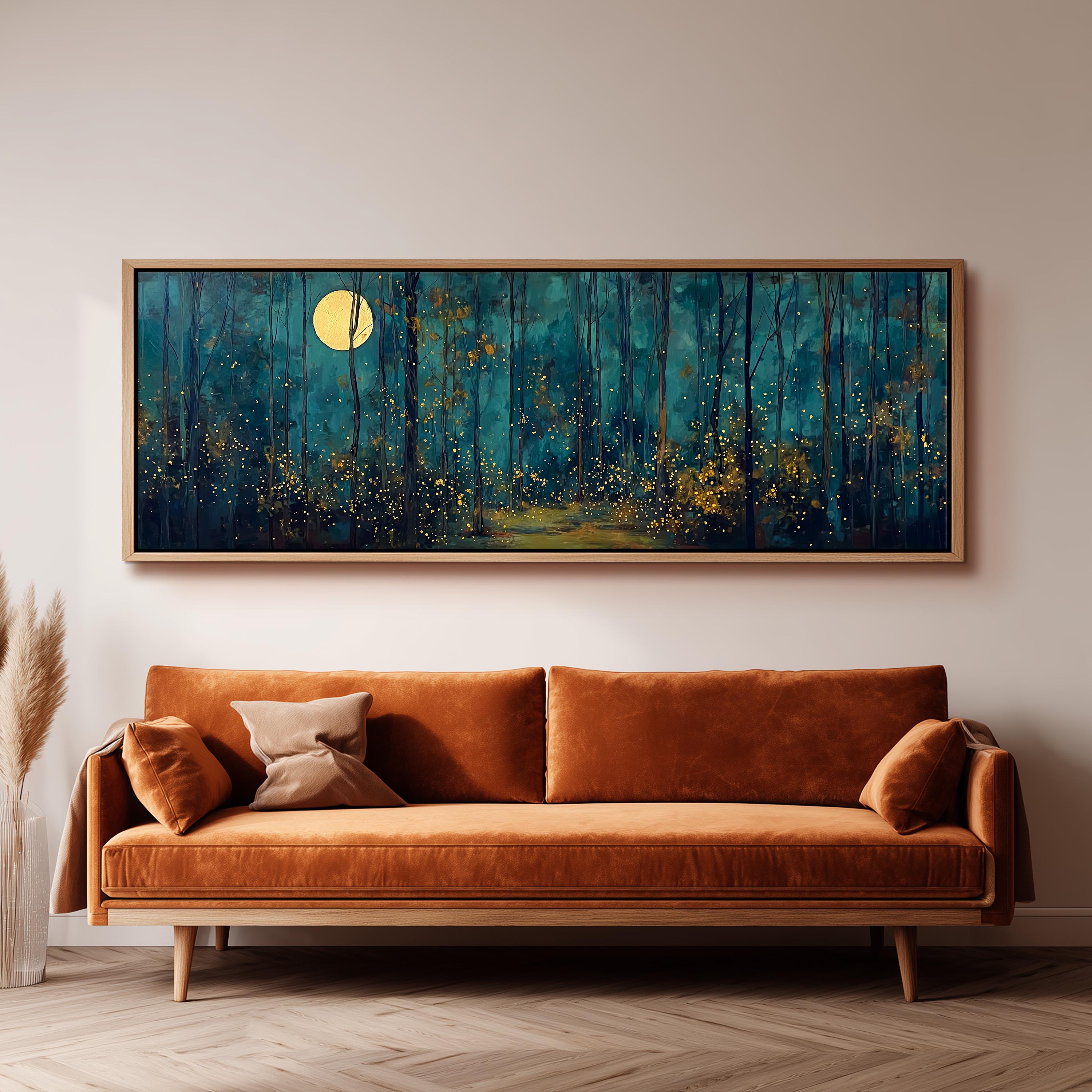a large, framed painting of a forest scene with a full moon in the background, hanging on a wall above a brown sofa.