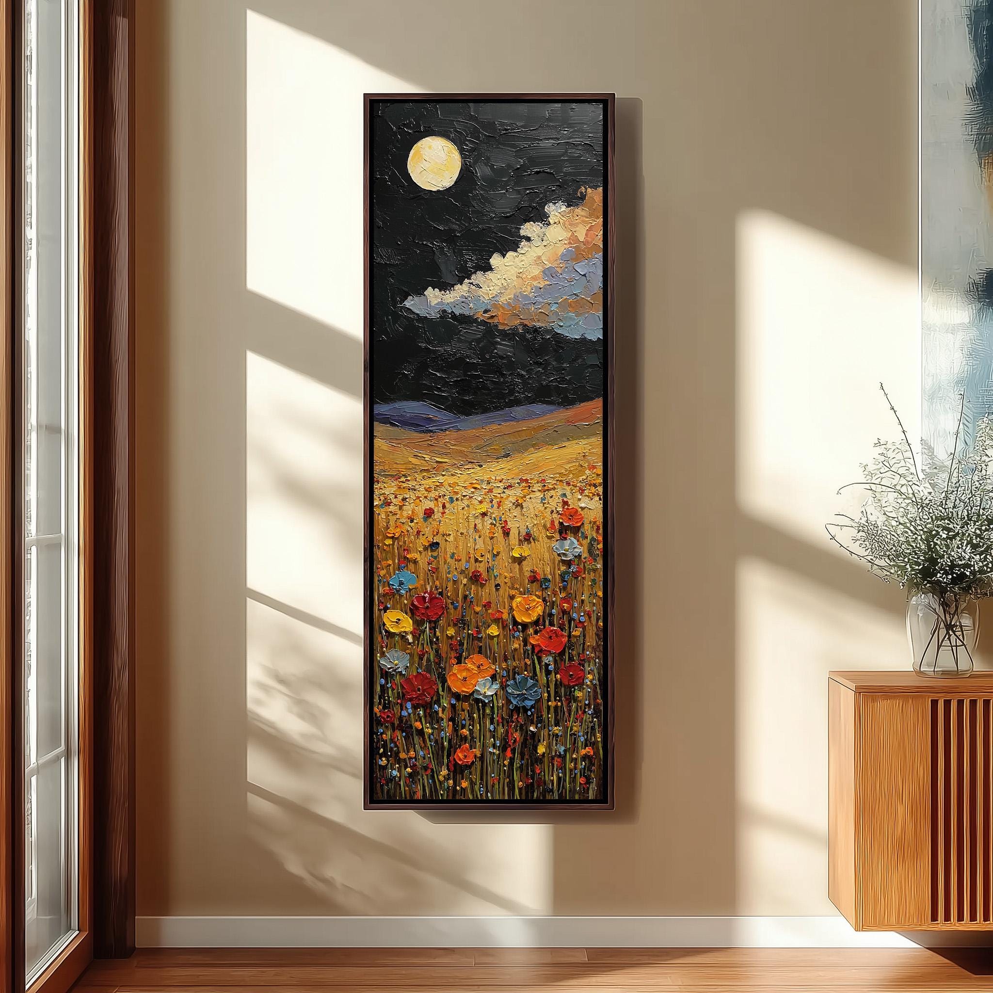 a large, colorful painting of a field of flowers hanging on a wall.