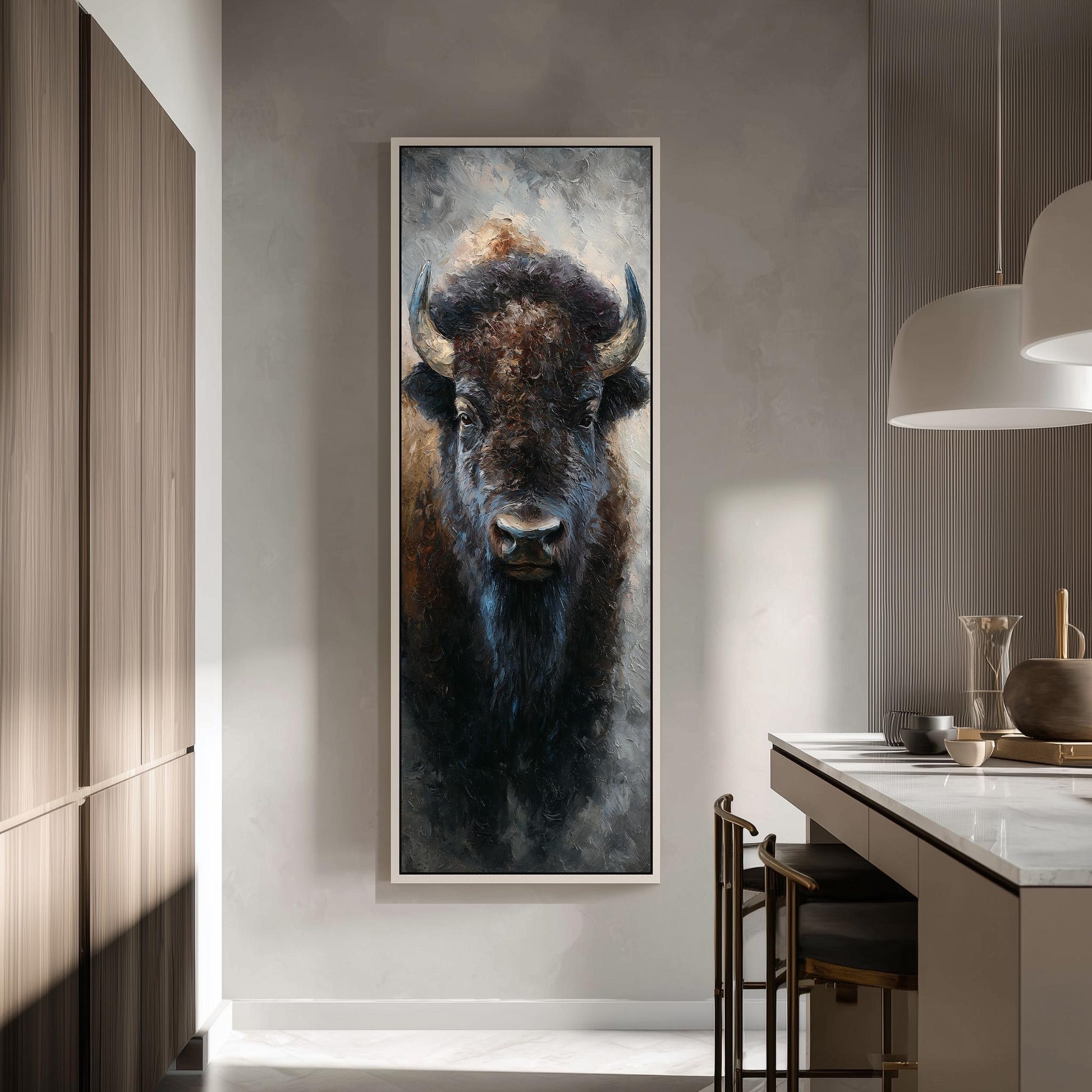 a large painting of a buffalo's face hanging on a wall in a modern kitchen.