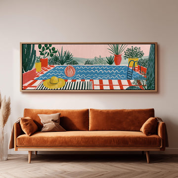 Colorful poolside courtyard long horizontal canvas print above a sofa in a living room