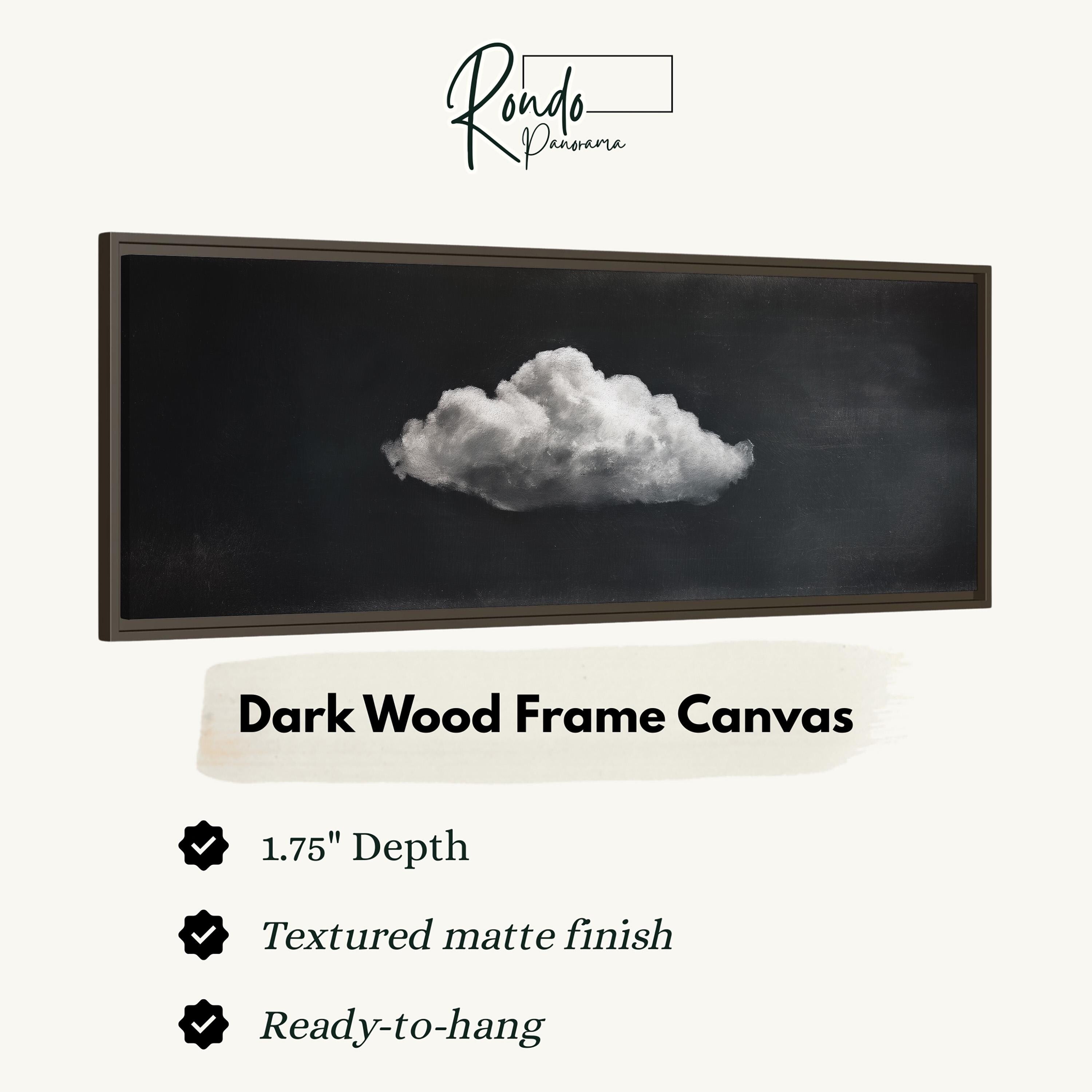 The image is a dark wood frame canvas depicting a single white cloud against a black background.