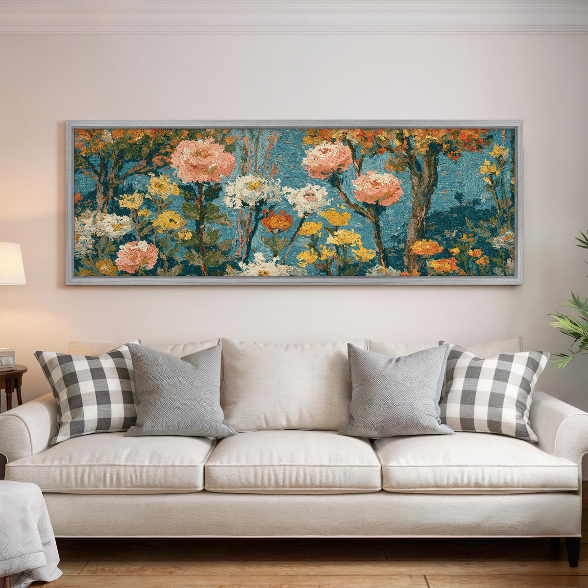 Pink blossom garden pattern panoramic canvas print above a white sofa in a bright living room