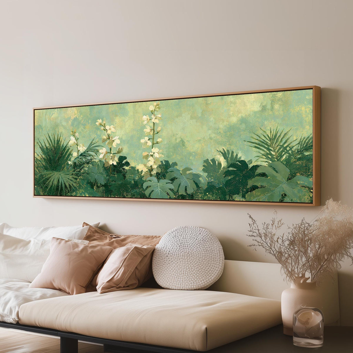 Tropical white blooms in green foliage long horizontal canvas print above a sofa in a living room