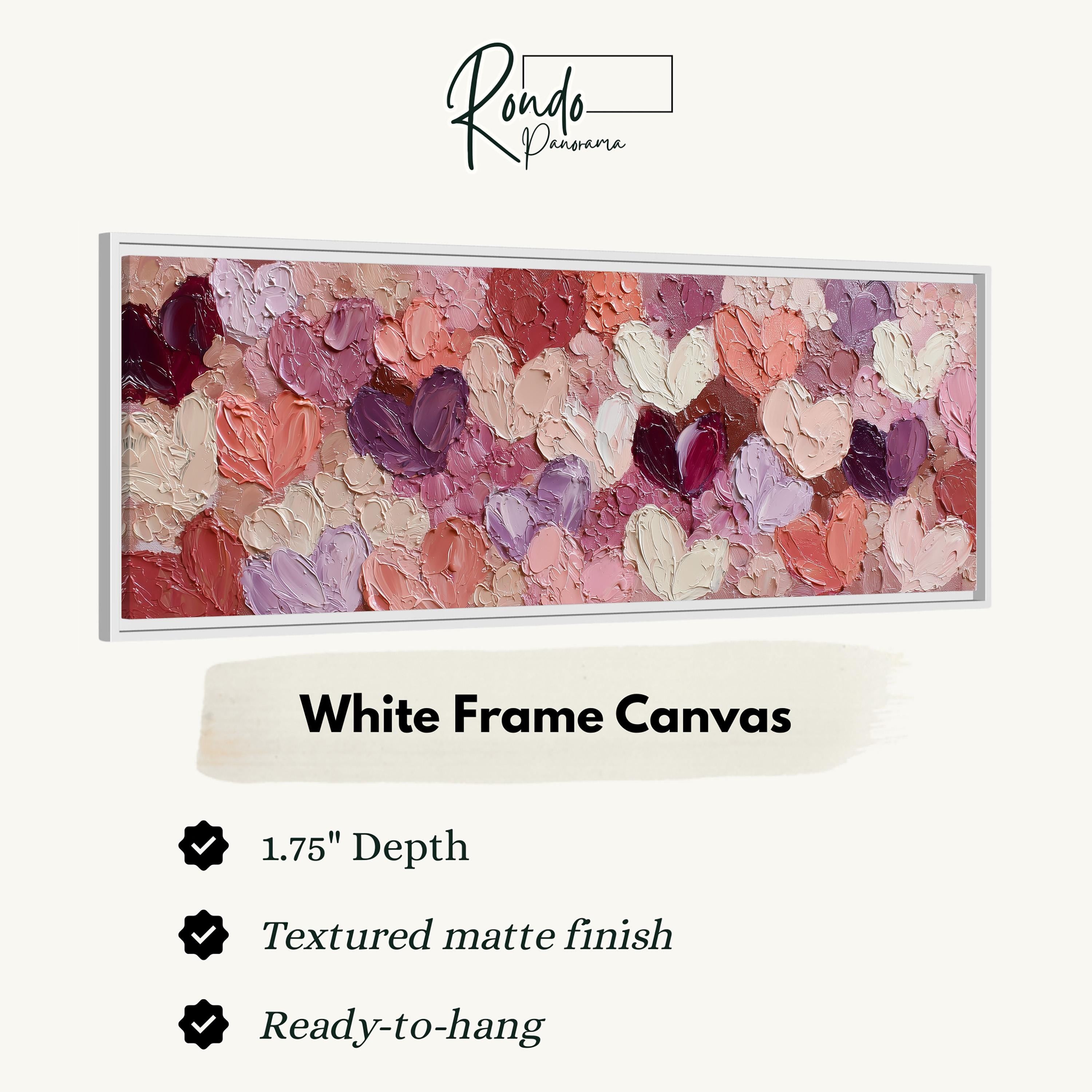 The image is a framed artwork featuring a textured white frame with a vibrant painting of hearts in various shades of pink and red.