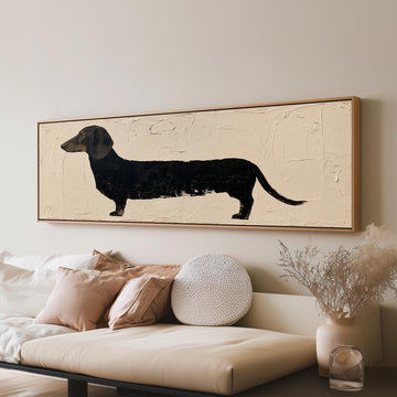Black dachshund silhouette long horizontal canvas print above a sofa in a living room