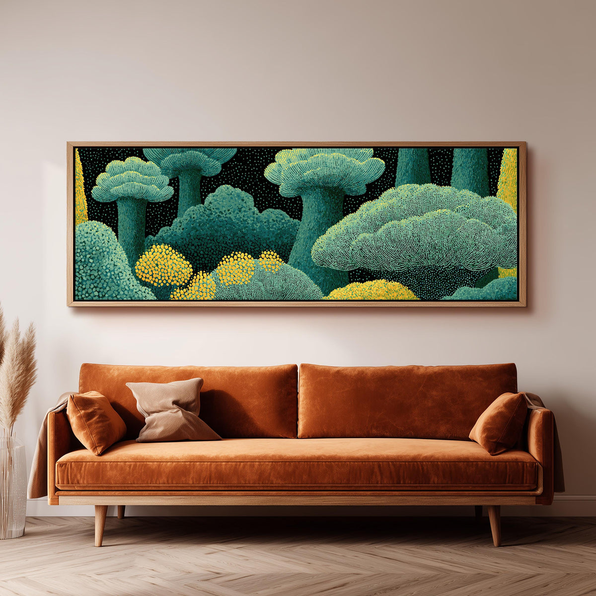 Teal dotted treetops panoramic canvas print above a sofa in a living room