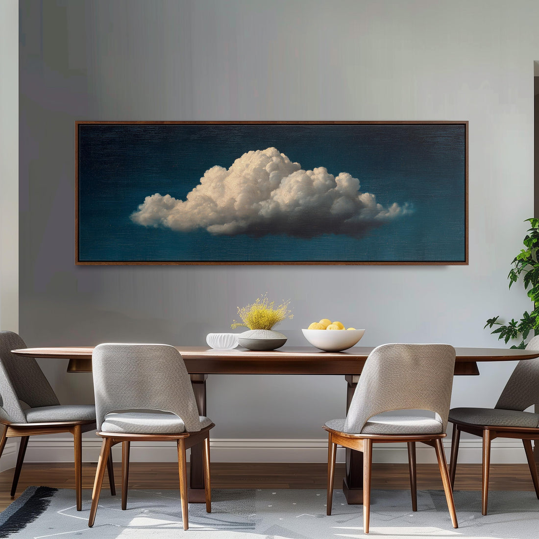 a black and white checkered sofa with a brown throw pillow, set against a dark wall with a large framed painting of a cloud above it.