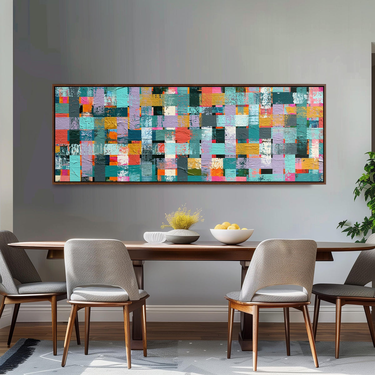 Woven grid of teal and pink blocks long horizontal canvas print above a dining table