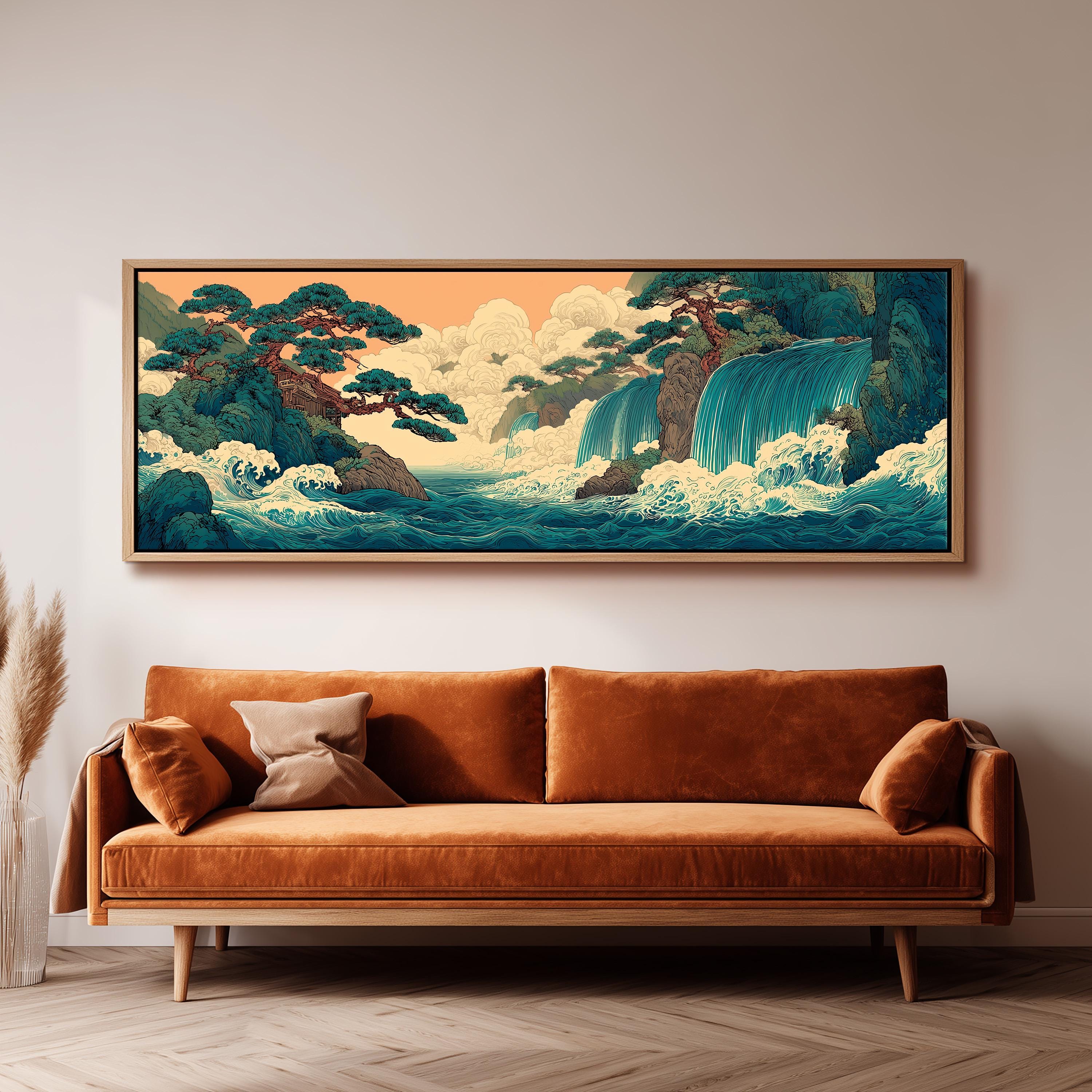 a large, framed painting of a serene landscape with a waterfall and trees, hanging on a wall above a brown sofa.