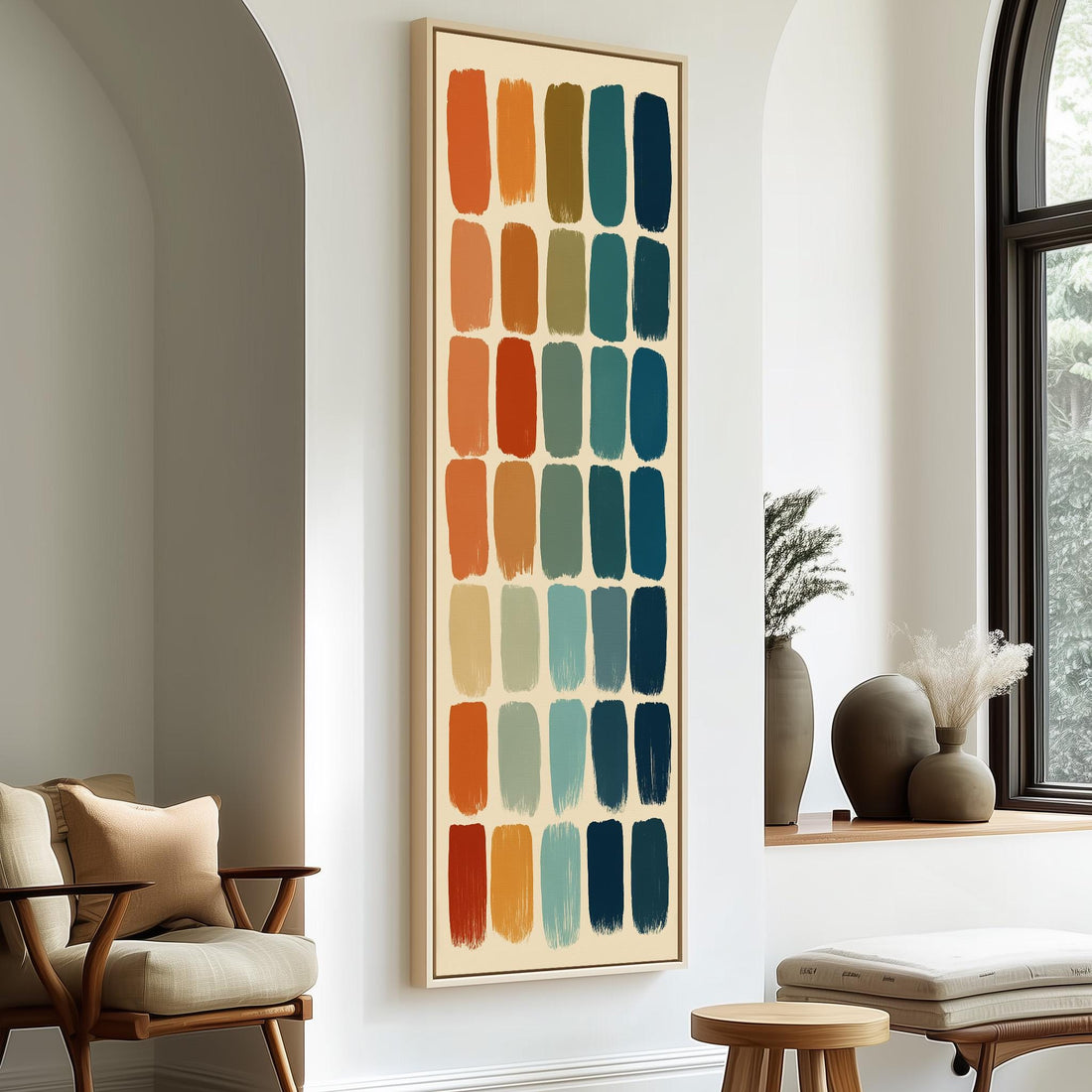 a modern living room with a large abstract painting hanging on the wall, a wooden chair, a small table, and a window with a plant on the sill.