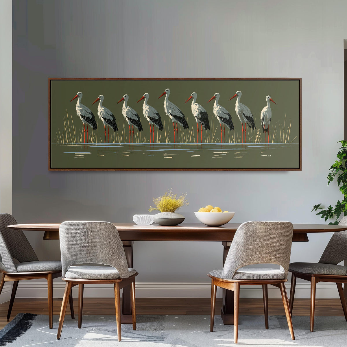 Flock of storks on olive green long horizontal canvas print above a dining table