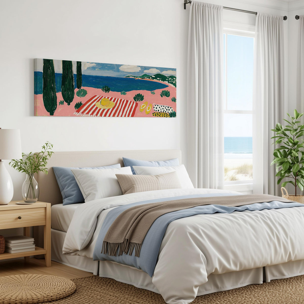 Mediterranean beach day with a striped towel panoramic canvas print above a bed in a coastal bedroom