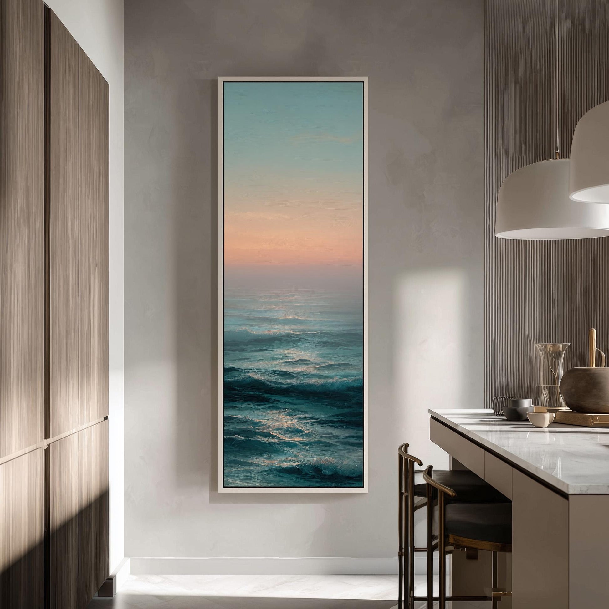 a large, framed painting of a serene ocean scene hanging on a wall in a modern kitchen.