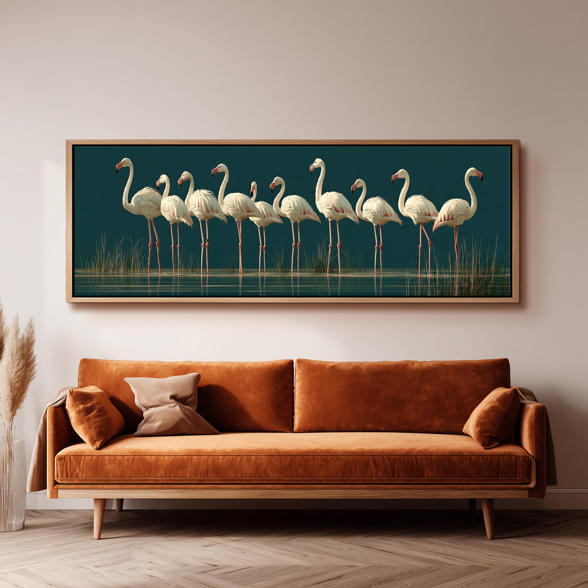 Pale flamingos wading on teal panoramic canvas print above a sofa in a living room