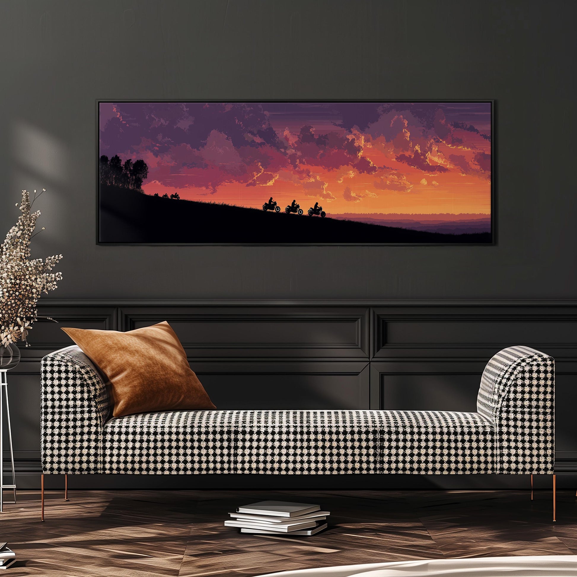 a large black and white checkered sofa with a brown throw pillow, set against a dark wall with a framed landscape painting depicting a sunset over a hill.