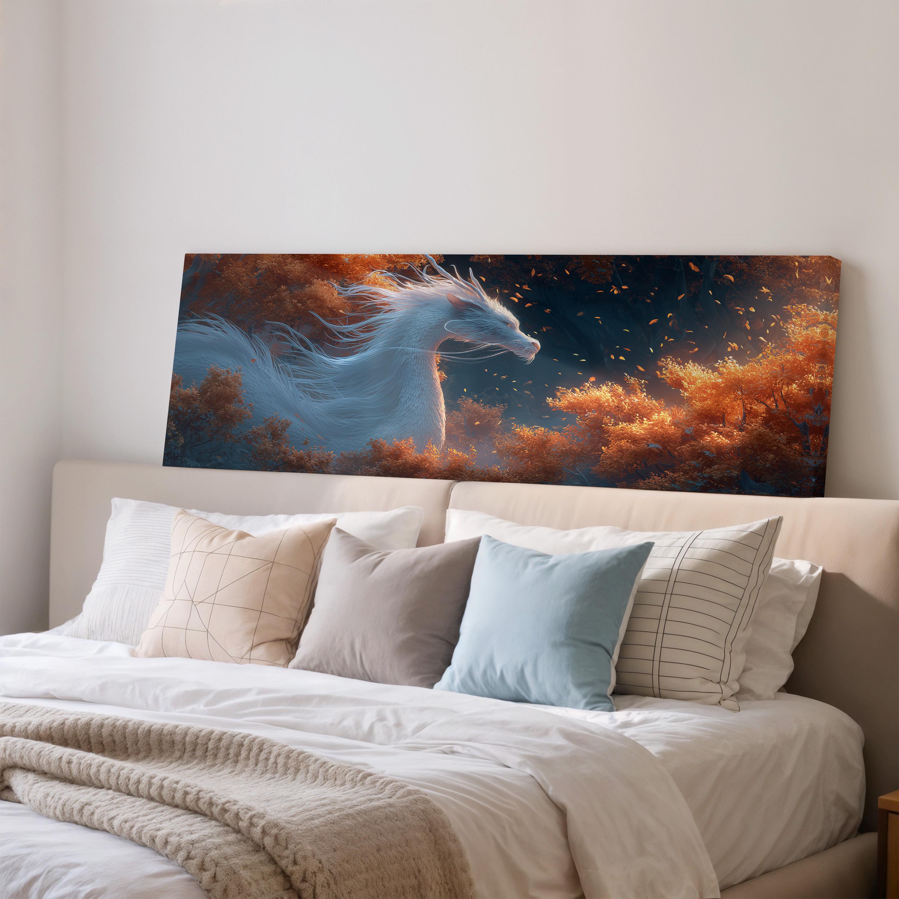 a large, colorful painting of a unicorn with flowing white mane and tail, set against a backdrop of orange and red foliage. The painting is displayed on a wall above a bed with white bedding and pillows.