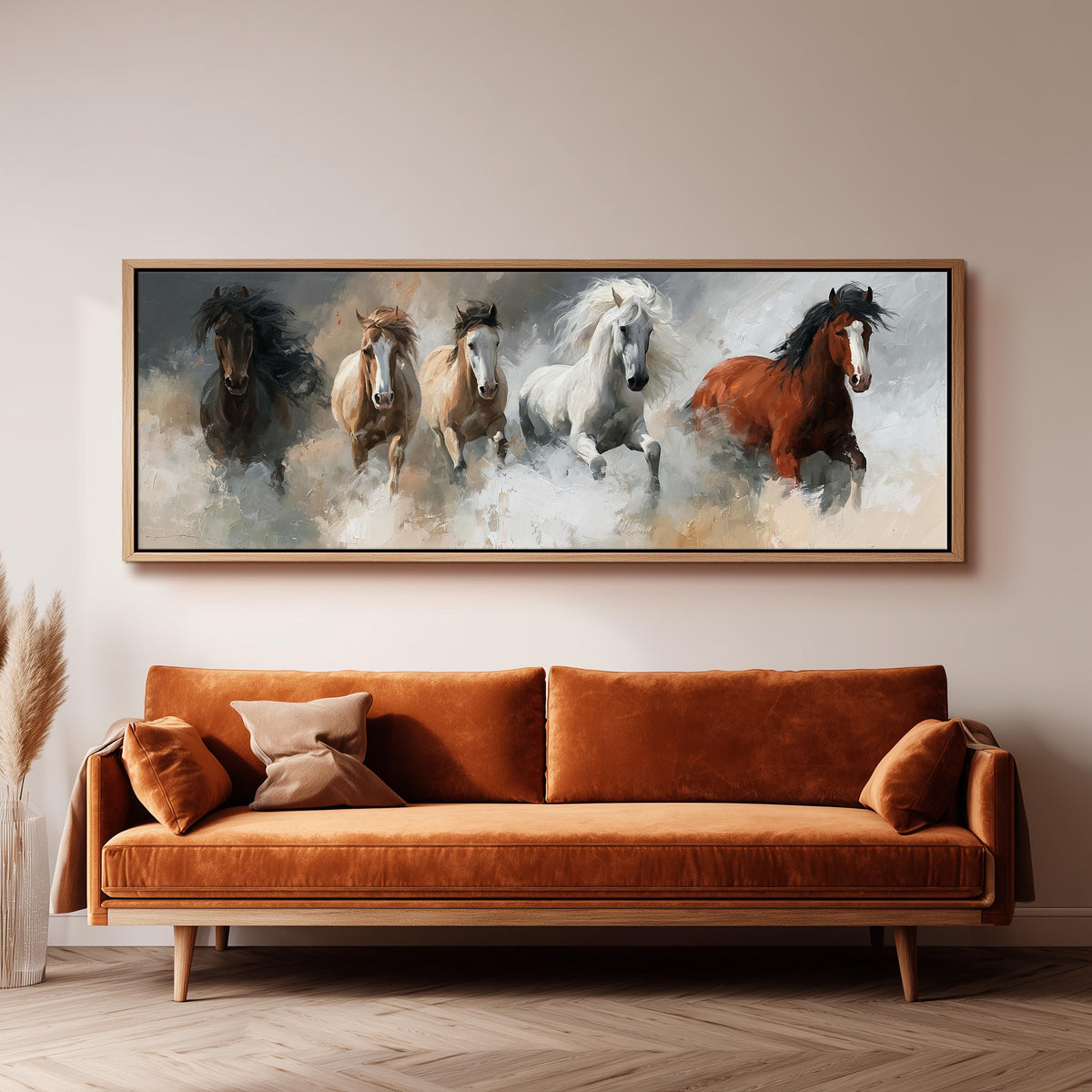 Five horses running through smoke panoramic canvas print above a sofa in a living room