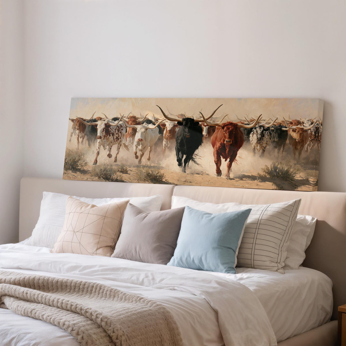 Longhorn cattle stampede wide panoramic canvas print above a bed in a bedroom