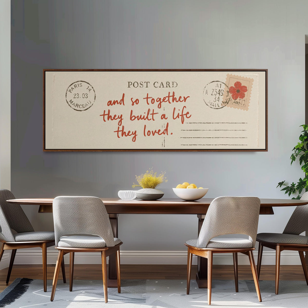 Paris postcard saying and so together they built a life they loved panoramic canvas print above a white sofa in a bright living room