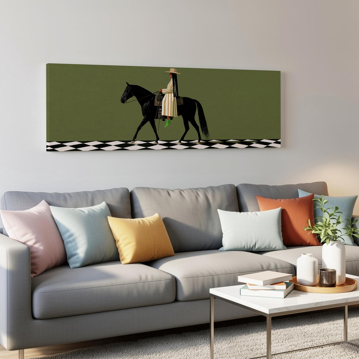 Woman riding a black horse on a checkerboard panoramic canvas print above a grey sofa in a living room