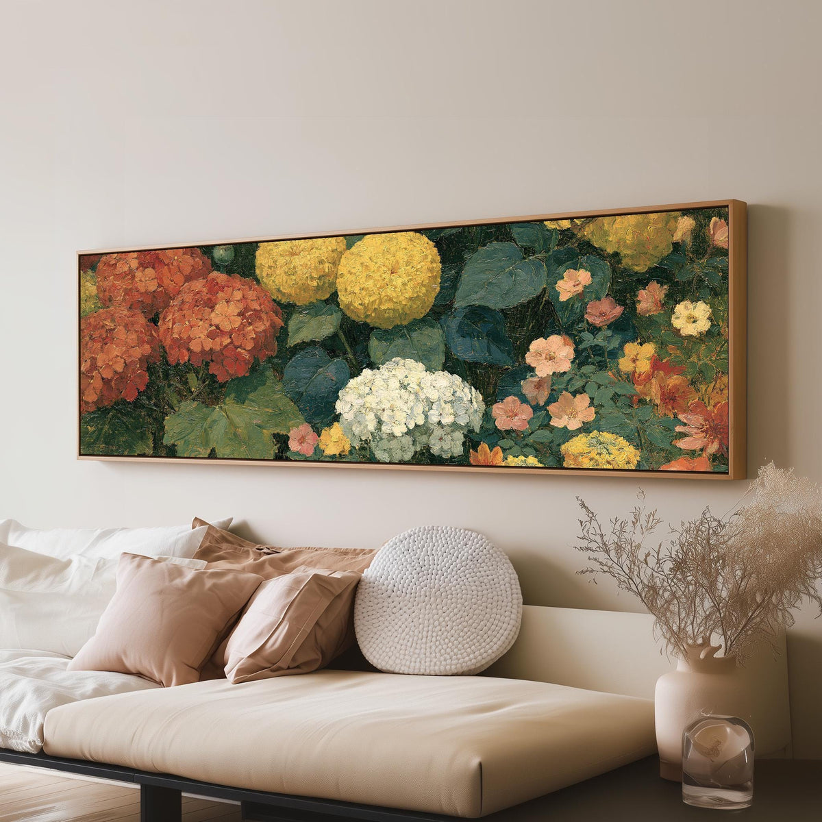 Warm hydrangea and dahlia bouquet long horizontal canvas print above a sofa in a living room