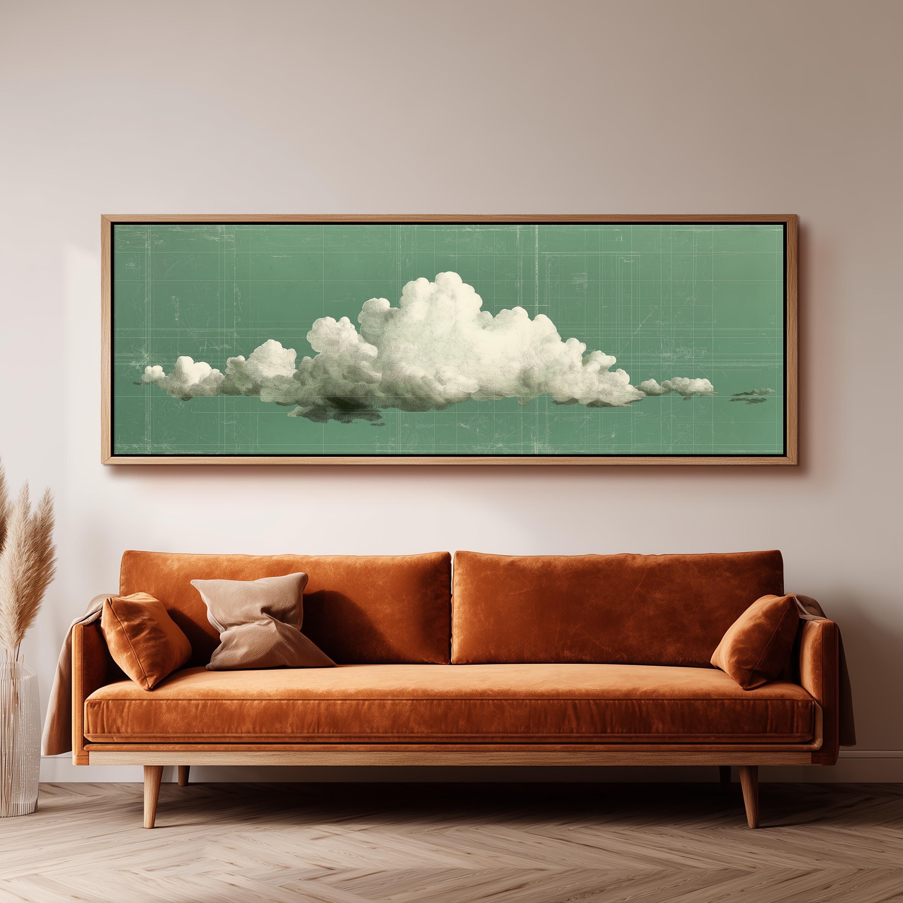 a large framed artwork depicting a cloud on a green background, hanging on a wall above a brown sofa with two pillows.