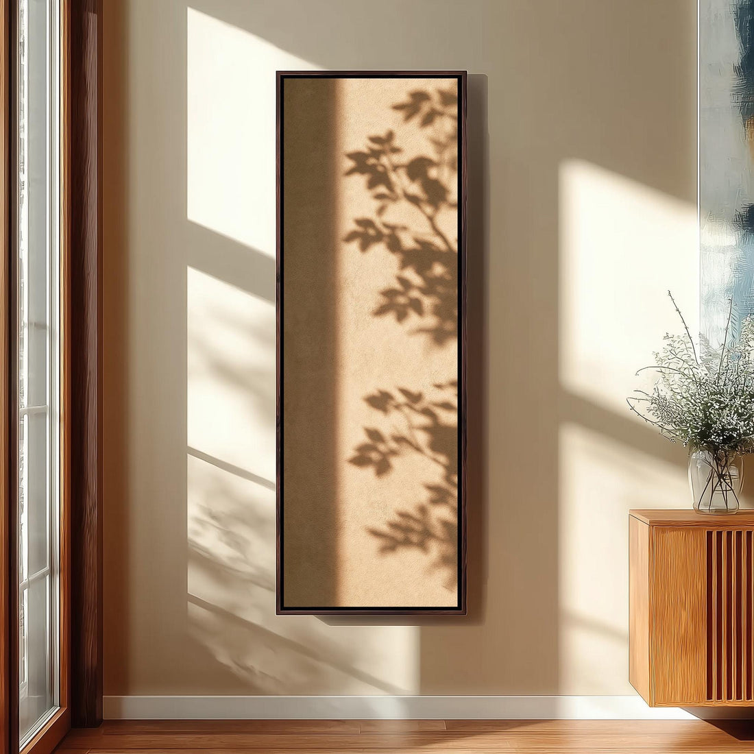 Leaf shadows on a warm tan wall long vertical canvas print in a sunlit living space