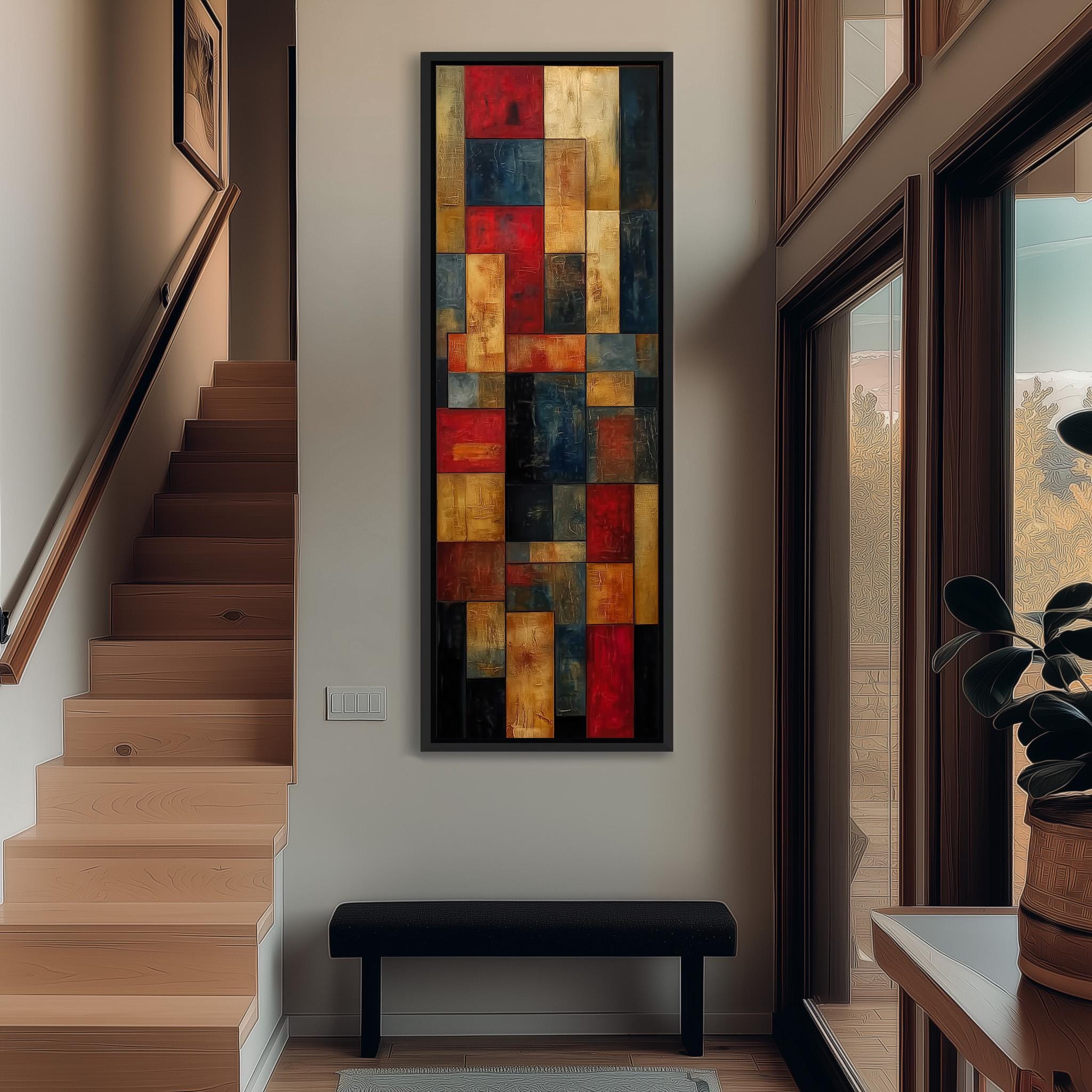 a modern and minimalist interior design with a large abstract painting hanging on the wall above a black bench. The painting consists of various geometric shapes in different colors, creating a vibrant and dynamic visual display. The room also includes a staircase, a potted plant, and a window, contributing to the overall contemporary aesthetic.