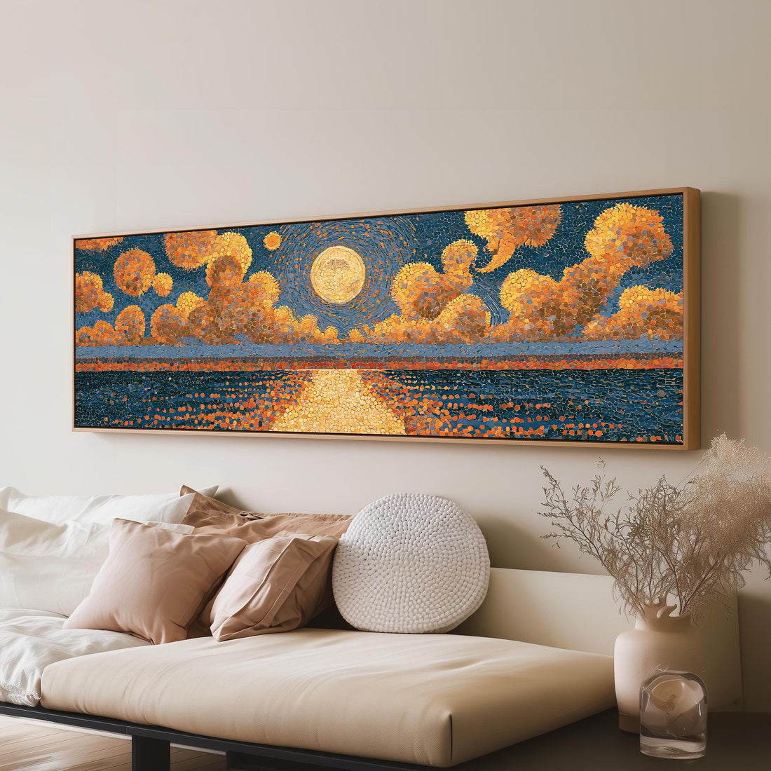 Golden sunset over a lake long horizontal canvas print above a sofa in a living room