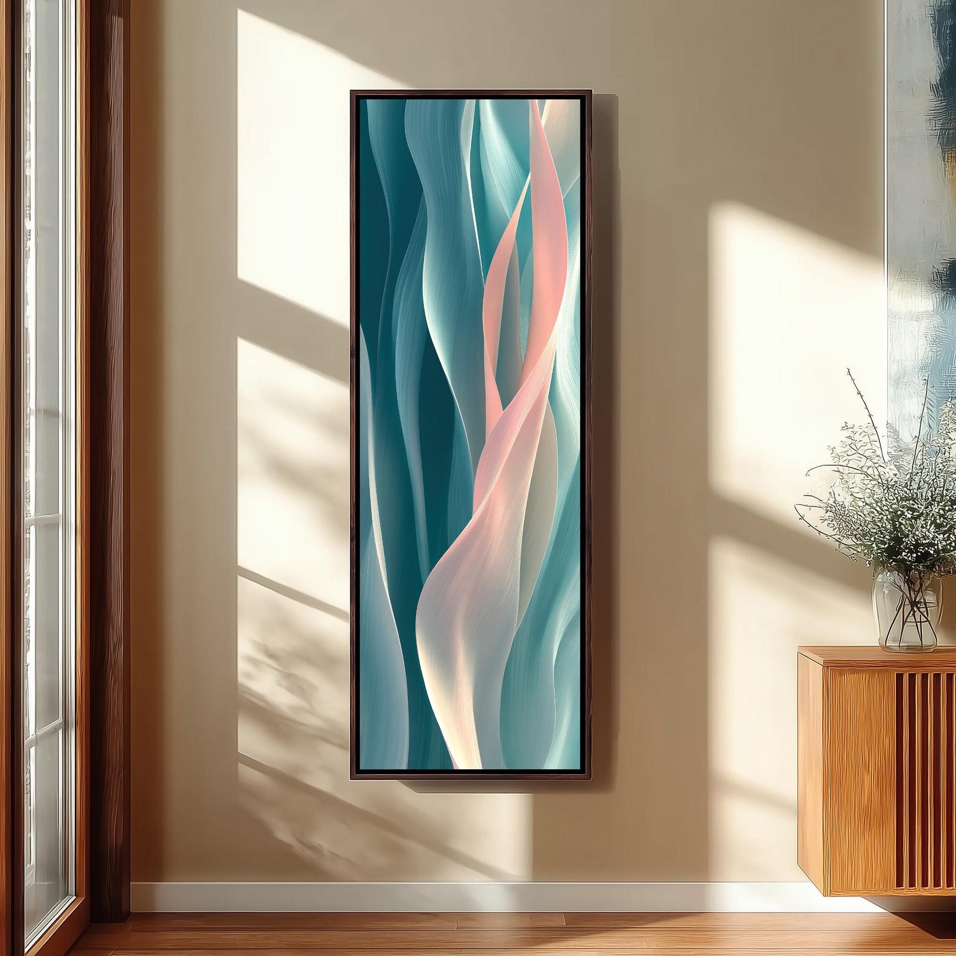 a large abstract painting hanging on a wall, with a wooden cabinet and a vase of flowers to the right of the painting.