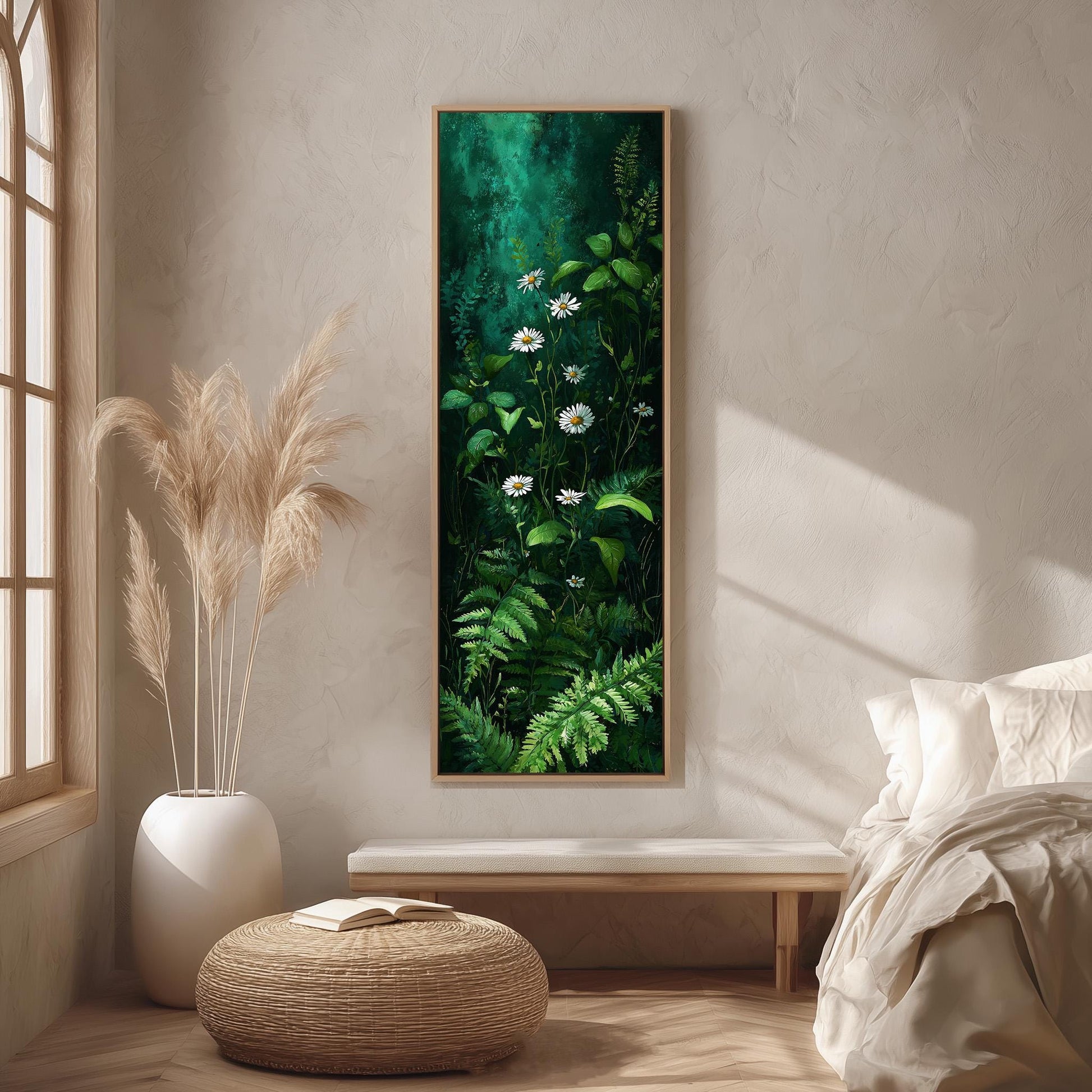 a serene and cozy bedroom scene, featuring a large painting of lush green foliage and white flowers hanging on the wall, a white bed with a white pillow, a white vase with tall potted plants, and a woven ottoman in front of the bed.